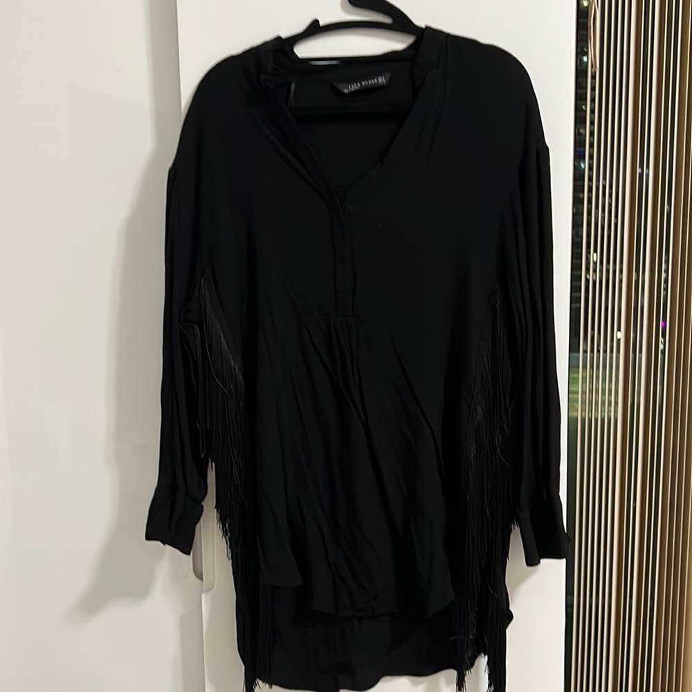 Black blouse with fringe